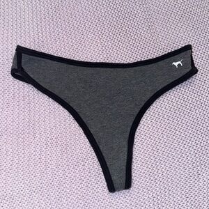 Gray and black Victoria’s Secret thong panty
